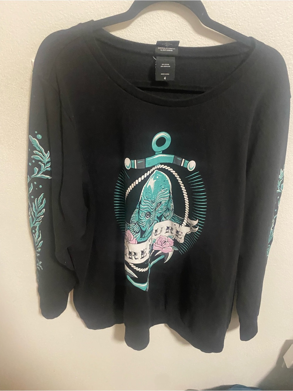 Universal Black "The Creature" Crewneck Sweater with Teal Graphic Size